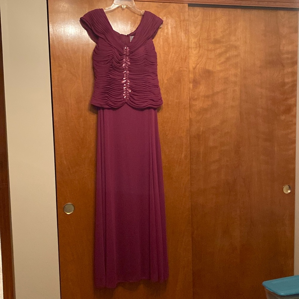 Beautiful pink gown with detailed top.  NWOT.